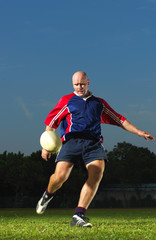 Rugby Player with his rugby ball