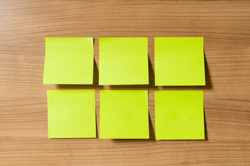 Fototapeta premium Many reminder notes on the wooden background