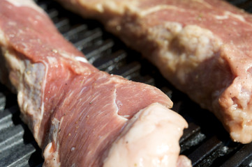 Closeup of raw steaks