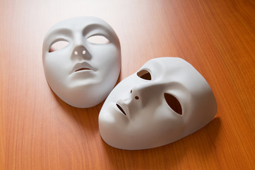 Theatre concept with the white plastic masks