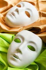 Theatre concept with the white plastic masks