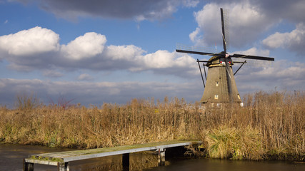 Windmill and Jetty Landscape