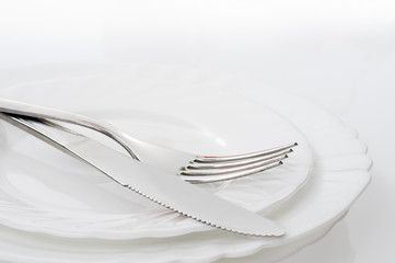 Knife and fork on a plate