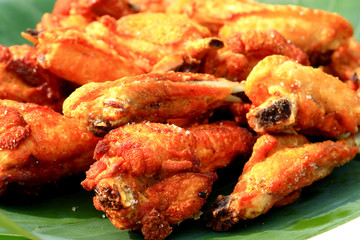 A Serving Of Deep Fried Chicken Wings .
