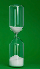 Eggtimer on green - time concept