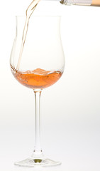 wineglass with rosé wine