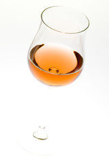 wineglass with rosé wine