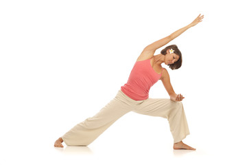 Naklejka premium Young woman doing yoga Side Angle Pose
