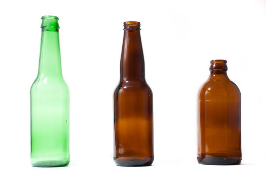 Three emplty beer bottles on isolated backround.