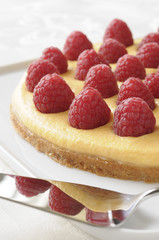 Tarte sablée au melon et aux framboises