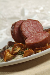 Saucisse de Morteau au morbier et aux girolles