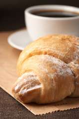 Croissant and black coffee