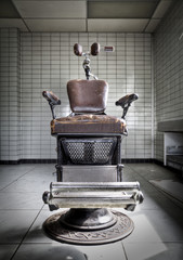 An old anxious dentist chair at an abandoned hospital