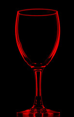 transparent red empty wine glass on black