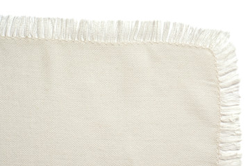 Close up of a white cotton napkin