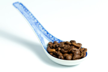 Coffebeans on a spoon