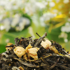 Loose green tea with jasmine flowers