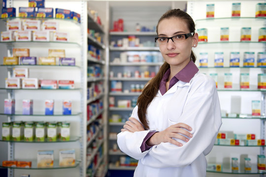 portrait of a female pharmacist at pharmacy