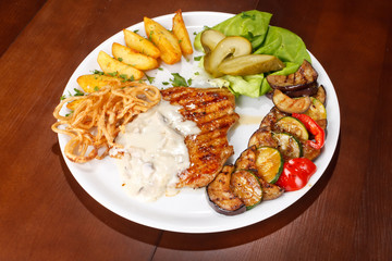 Grilled steak with vegetables