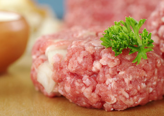 Raw meatball with parsley on top (Selective Focus)