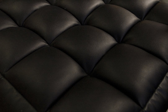 Coussinets de cuir noir en perspective