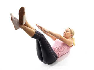 Obraz premium Young Woman Doing Stomach Crunches. Model Released