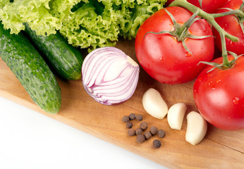 Fresh vegetables on wooden hardboard
