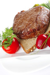 red meat on bread with vegetables
