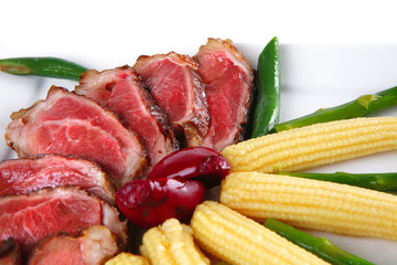 beef meat served with corns