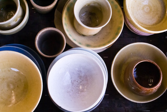 A collection of Japanese ceramic bowls and cups from above