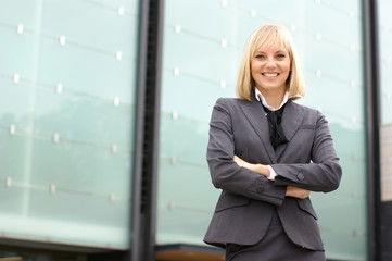 A young blond businesswoman in formal clothes