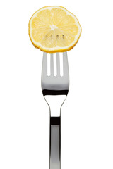 lemon slice sticked on fork