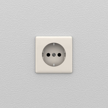 Electrical outlet on white wall