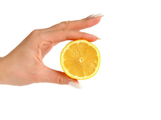 Round slice of lemon in a female hand