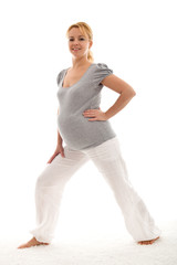 Fototapeta na wymiar Beautiful pregnant woman exercising