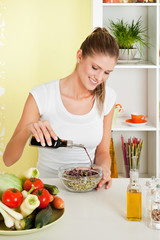 Beauty, young girl making salad