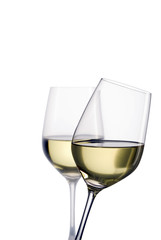 two glasses of white wine with a white background
