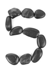Number '5' made of stones isolated on white