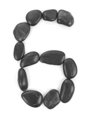 Number '6' made of stones isolated on white