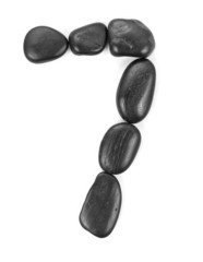 Number '7' made of stones isolated on white