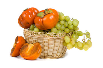 Ripe persimmons and grapes