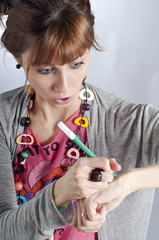 Obraz premium Young girl with pigtails, and colorful necklace