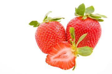 Three fresh strawberries isolated on white background.