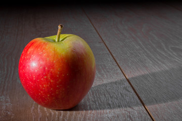 Apple on Wooden Table