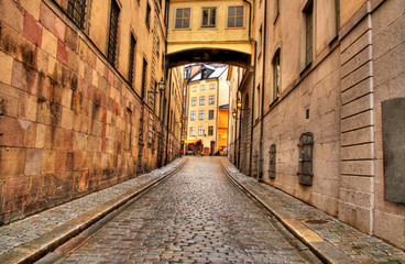 Fototapeta na wymiar Narrow street in historical part of city of Stockholm - HDR Imag