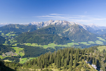 a view from the top of the alpine peak in the summertime