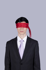 blindfold businessman