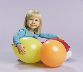 Fototapeta na wymiar girl with baloons