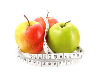 Apples and a measure tape, diet concept