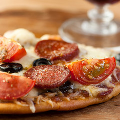 Rustic pizza with chorizo salami
